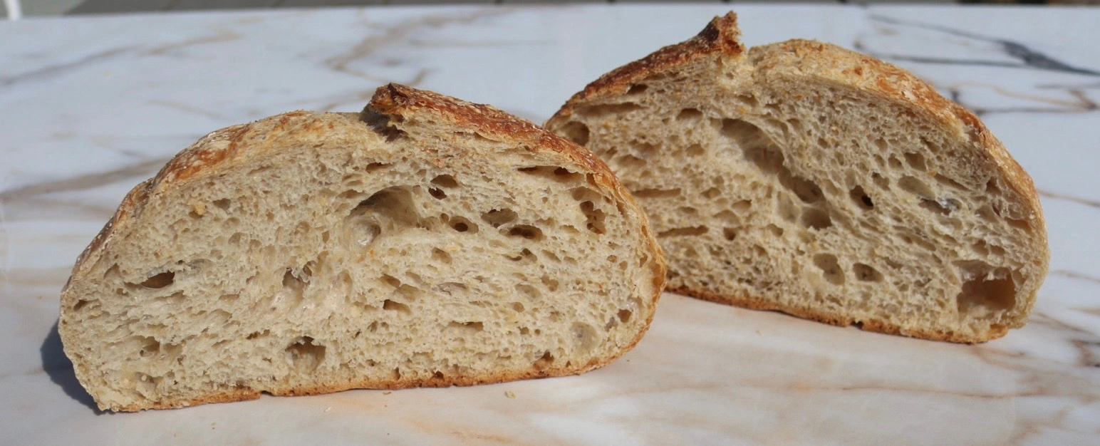 Garlic bread sourdough loaf cut in half